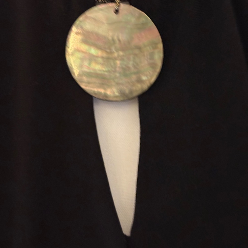 Black Top with Shell Pendant
